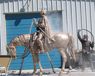 Sandblasting Outdoor Bronze Sculpture in Kansas City, MO