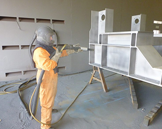 Sandblasting Structural Steel Beam Supports in Kansas City, Kansas